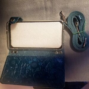 Hand crafted cell phone  case with strap.